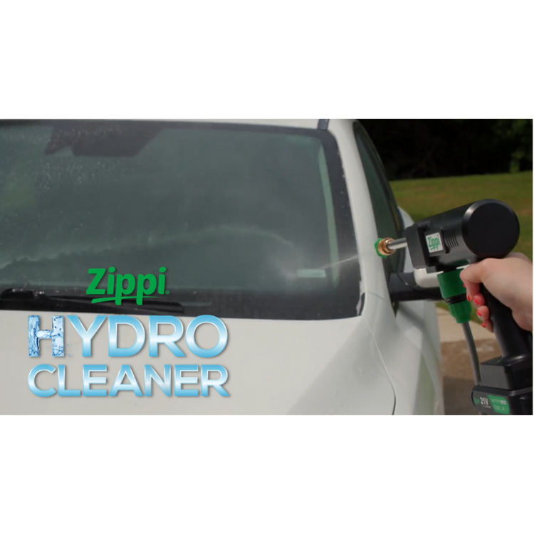 Person using a Zippi Hydro Cleaner on a car window