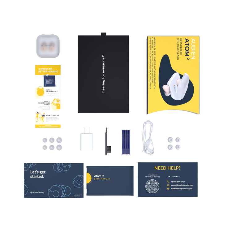 Collection of electronic components and packaging on a white background