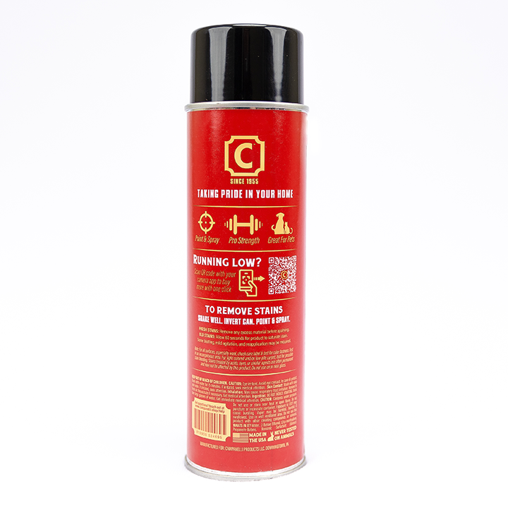Red spray can with black cap on a white background