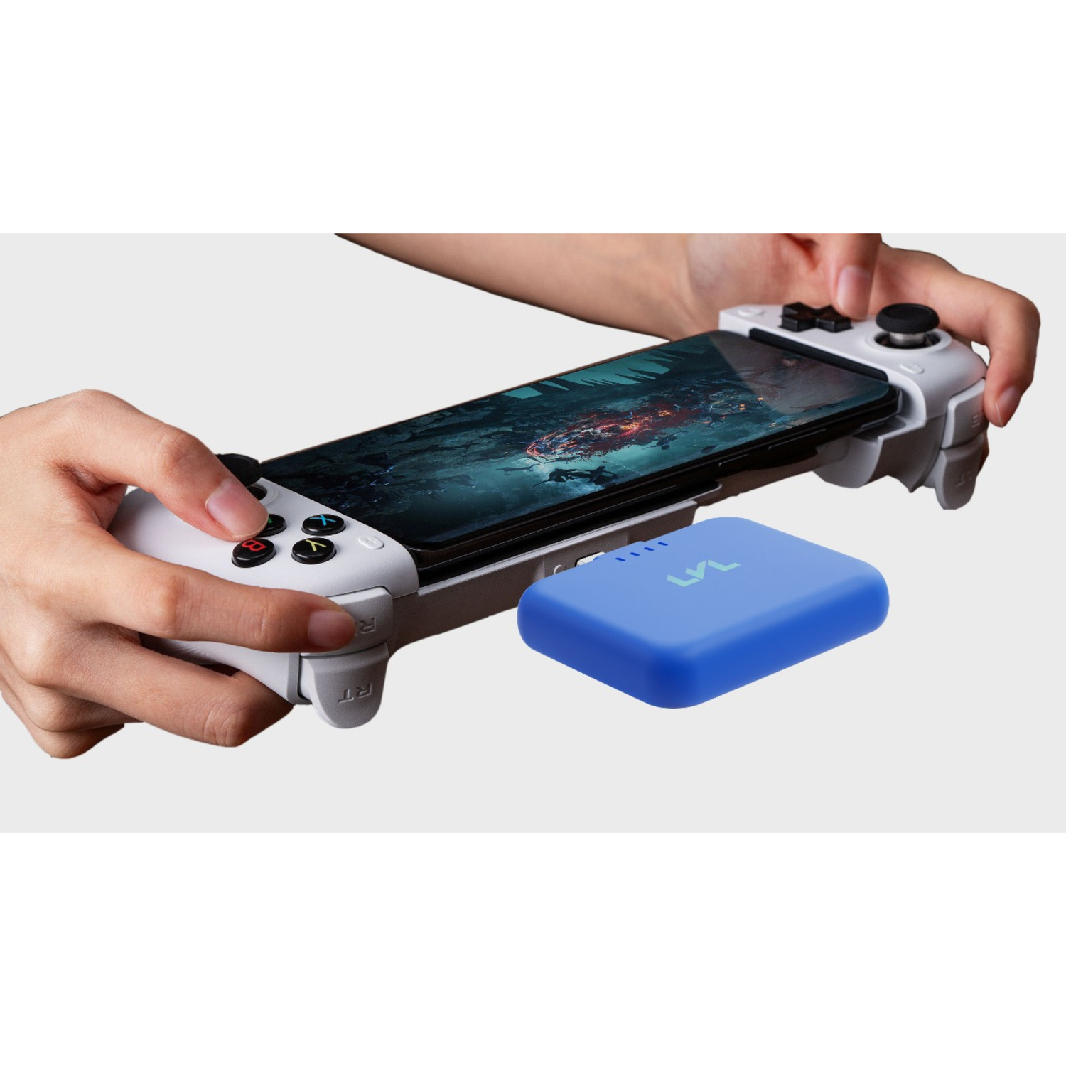 Hand holding a smartphone with a gaming controller attached, featuring a blue device on a white background.