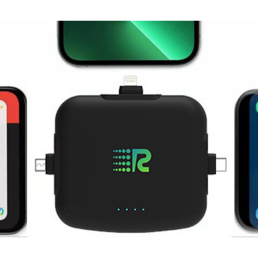 Four portable battery chargers in different colors: pink, blue, white, and black, each with a label displaying the brand.