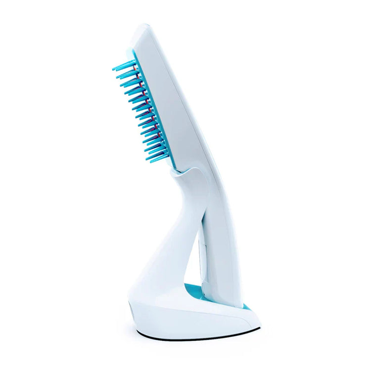 White and blue hairbrush on a white background