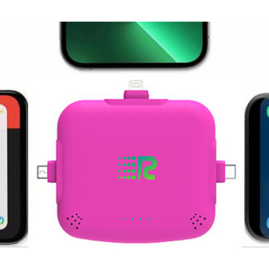 Four portable battery chargers in different colors: pink, blue, white, and black, each with a label displaying the brand.