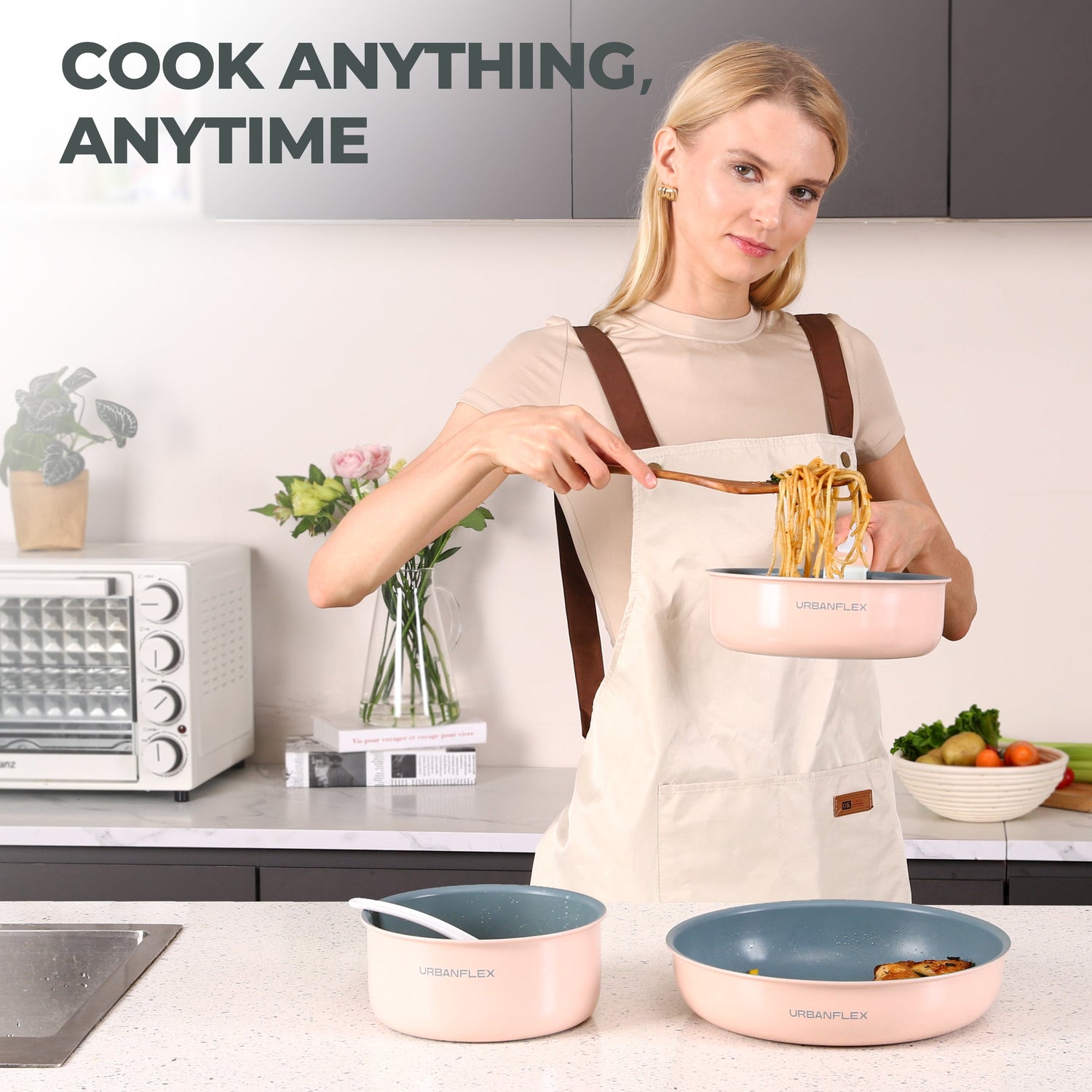 Woman cooking in a kitchen with cookware, text 'Cook Anything, Anytime' above.