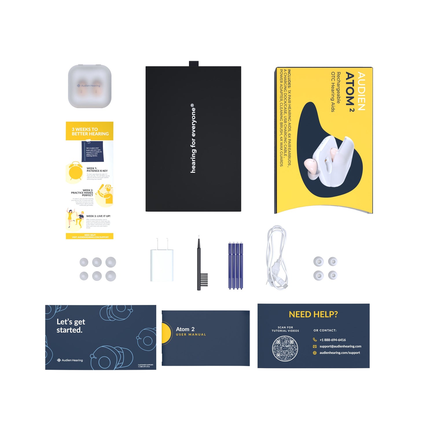 Collection of electronic components and packaging on a white background