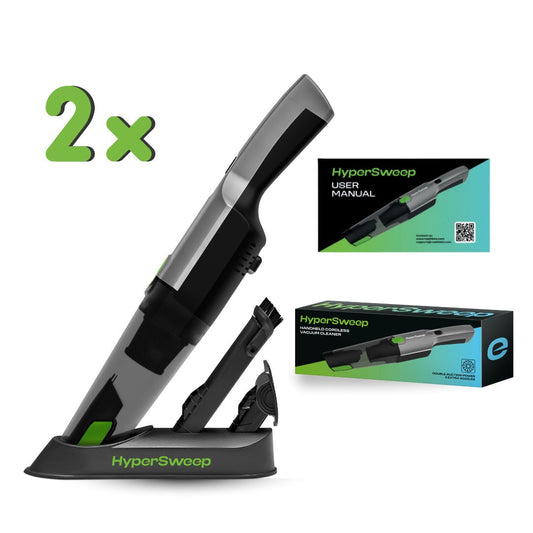 Set of two black and green window cleaning tools on a white background
