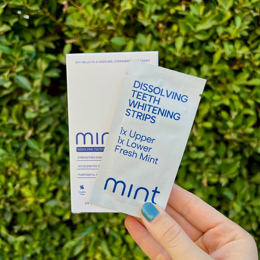 Box of Mint dental whitening strips on a white background