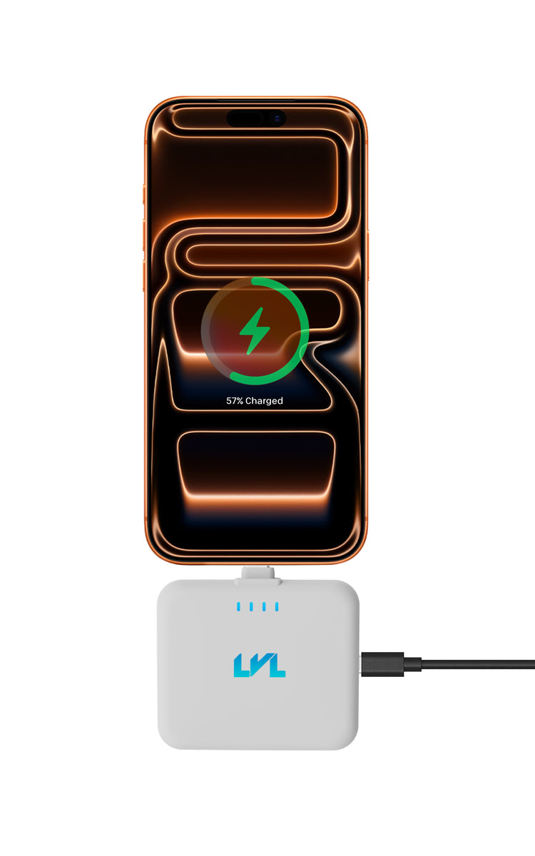 Phone with a charging cable and adapter on a white background