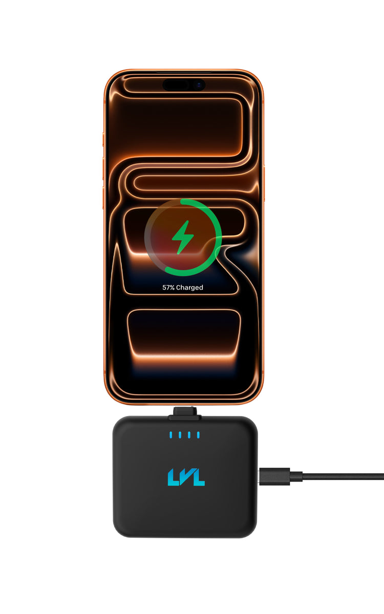 Wireless charging pad with smartphone displaying charging progress on a white background
