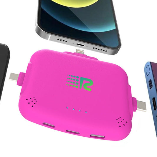 Four portable battery chargers in different colors: pink, blue, white, and black, each with a label displaying the brand.