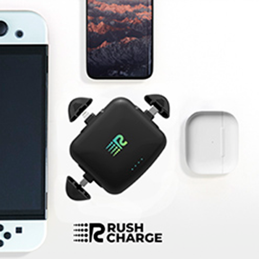 Four rectangular black portable power banks with a green 'R' logo on the front, arranged horizontally.