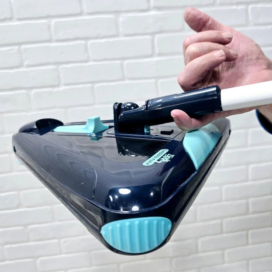 Mop with a black head and gray handle on a white background