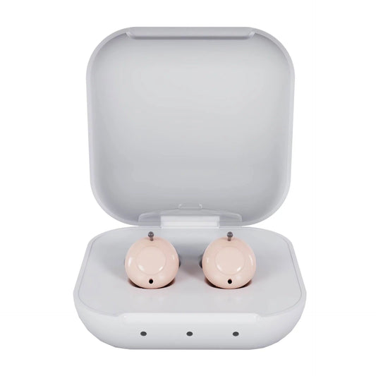 A pair of beige Audien Atom 2 hearing aids with a charging case open and one hearing aid inside, along with a depiction of the other hearing aid outside.