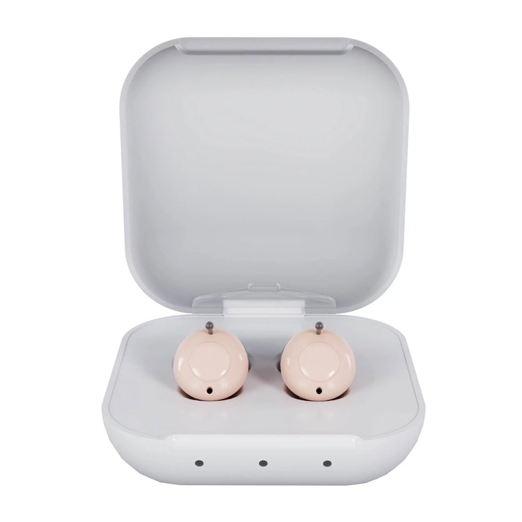 Pink wireless earbuds in a transparent charging case on a white background
