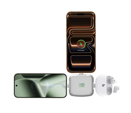 Four small electronic trackers in different colors (gray, mint green, pink, and white) lined up in a row against a plain white background.